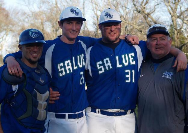 Kyle Pheland and Daniel Kehew are flanked by the catcher of their respective pitching gems, Dominic Di Sano (left), and head coach Steve Cirella (right). Cirella has now coached three complete-game no-hitters; Di Sano was behind the plate for Brandon Bursie's no-hitter at Curry College (4/10/11).