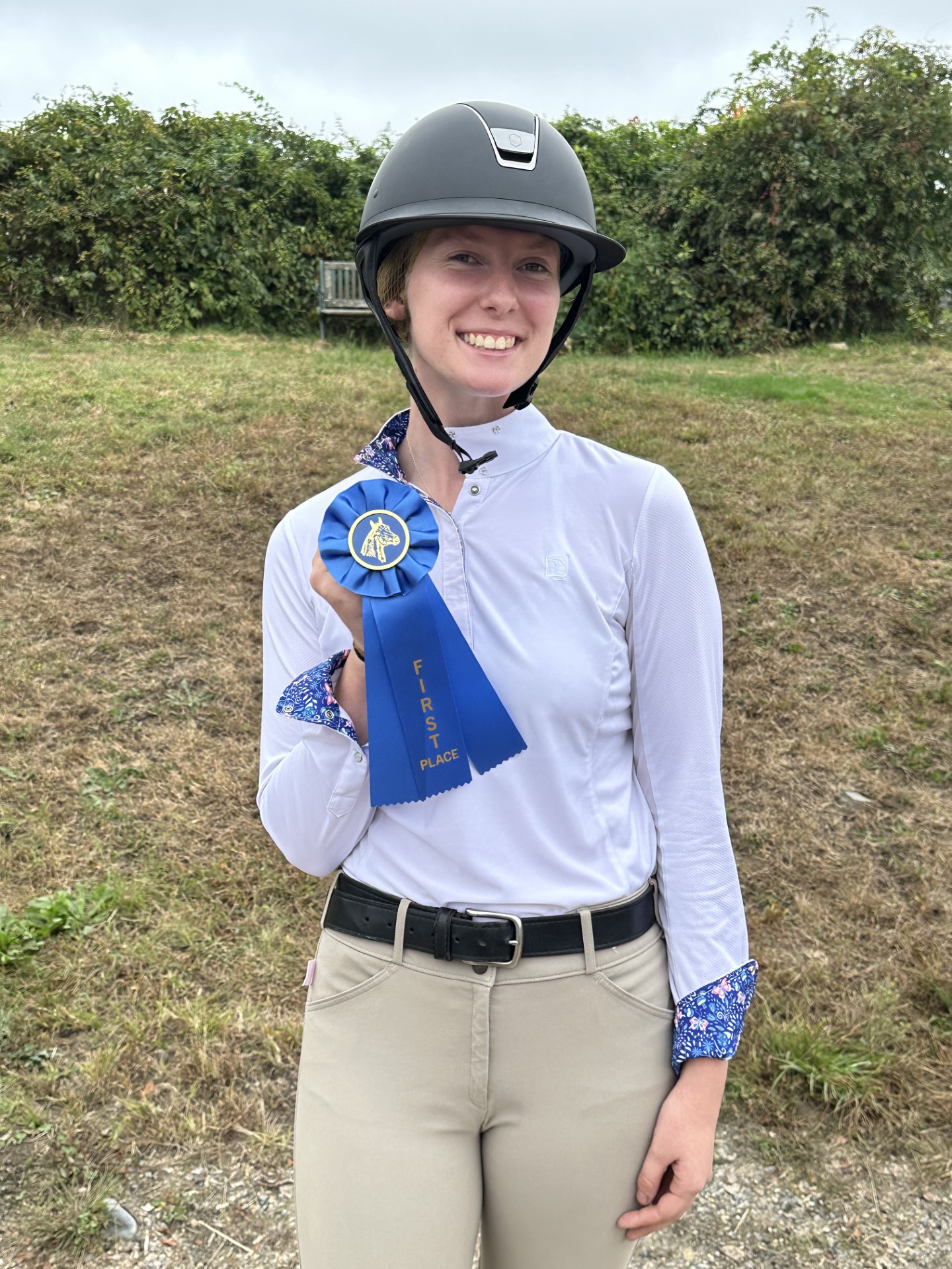 Emme Cox with her blue ribbon on Limit flat
