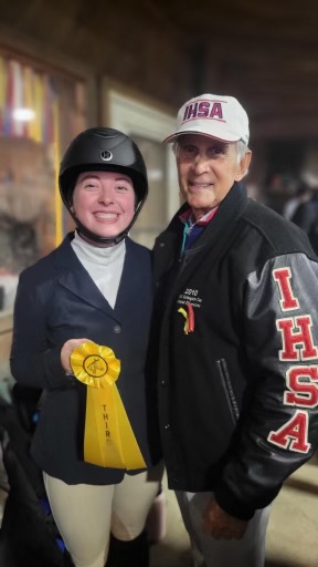 Emilie-Rose Bazzinotti with her yellow ribbon and IHSA founder, Bob Cacchione