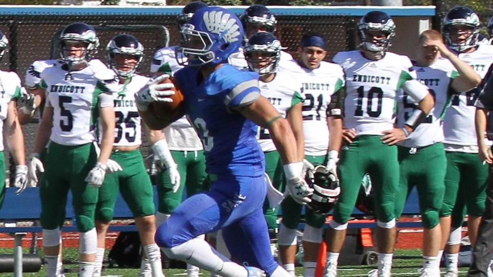 Gull watching: Endicott players on the sideline can only watch as Salve Regina wide receiver Brendan Nunes races to the endzone with a 34-yard catch for the game's first score. Seahawks defeated the Gulls, 41-14, at Toppa Field in Newport. (Photo by Zan Carver)