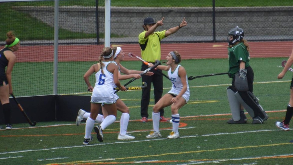 Olivia St. Jean celebrates game-winning goal with Ashley Cody and Kaity Gannon.