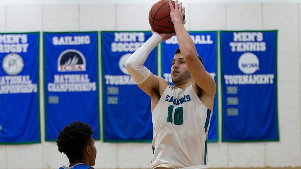 Salve Regina sophomore Mikey Spencer scores a program-record 43 points with a record-tying nine 3-pointers in a 97-86 win over Connecticut College. (Photo by Rob McGuinness)