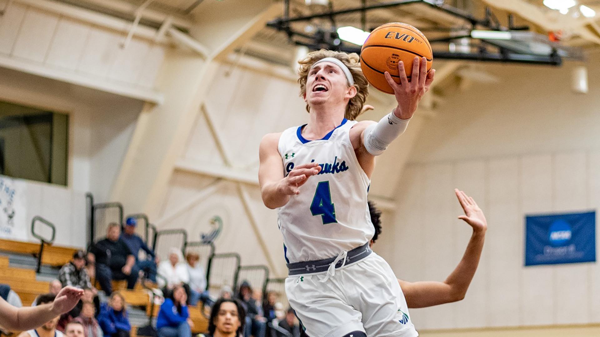 Clay Brochu scored a season-high 27 points to lead Salve Regina men's basketball to a season-finale win over Emerson, 84-73. (Photo by George Corrigan '22)