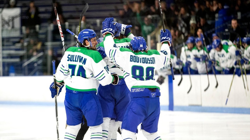 The Seahawks celebrate one of their four goals in a 4-3 victory over Nichols to advance to the NCAA Division III Frozen Four in Lake Placid, N.Y.