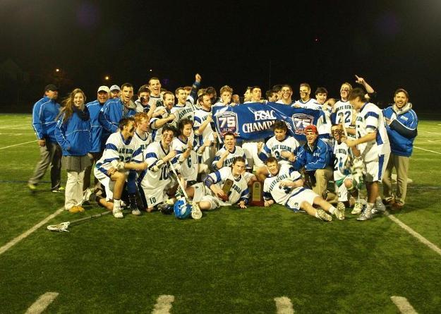 A jubilant Salve Regina men's lacrosse team after capturing the 2014 ECAC Division III New England Championship.