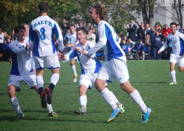 Seahawks celebrate Jacob Weinshank's (#8) first goal after assists from Devin L'Heureux (#14) and Bobby Ernst (#25, on Weinshank's right). Salve Regina def. Nichols, 2-0, and captures the 2012 Commonwealth Coast Conference Men's Soccer Championship; the Seahawks earn the automatic bid to the NCAA Championships which will be announced on Monday.