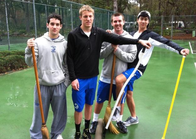 Monaf Awwa, Aaron Isch, Kenneth McCormack, and Khoa Nguyen helped dry the courts at Hilton Head Island Motorcoach Resort to prepare for match with Marietta.