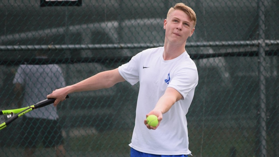 Senior Kevin Hunt competed in doubles (No. 3) and singles (No. 6) against the Pride on Wednesday. (Photo by Ed Habershaw)