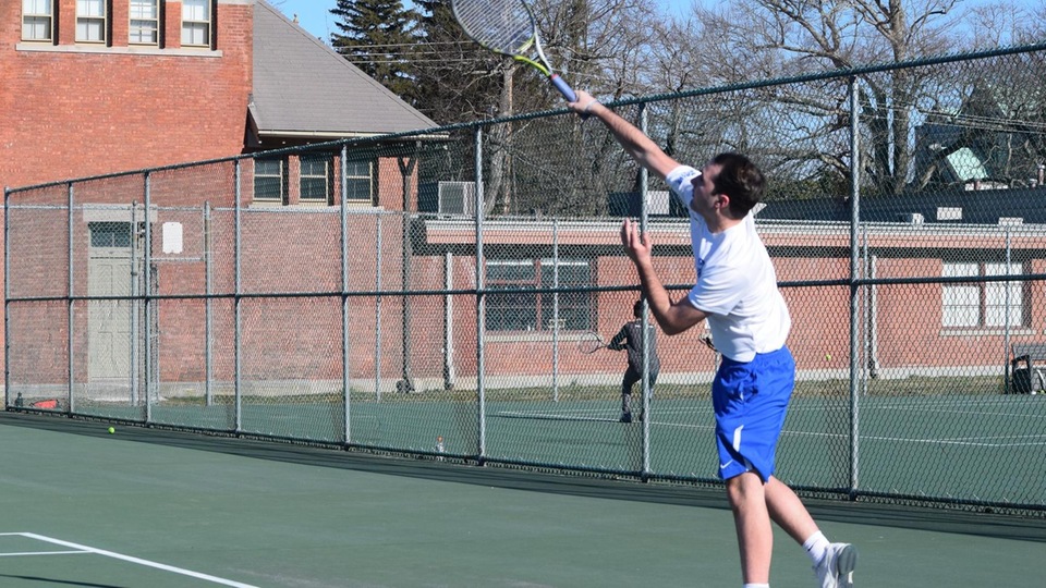 Matthew Newfield delivers serve for the Seahawks. (Photo by Jennie O'Connell)