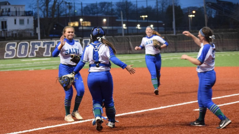 Jaycee Garrigan (left in photo) completes a two-hit shutout, 3-0, for Salve Regina to salvage a split with visiting Eastern Connecticut State at Toppa Field. (Photo by Hannah Filiault)