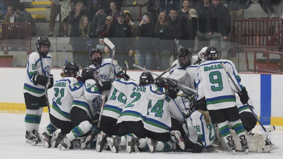 Seahawks celebrate on ice after Suzi Pearson's goal in second overtime. (Photo by Ed Habershaw)