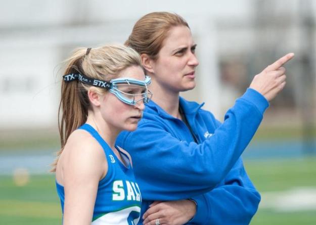 Head coach Jennifer Foster (right) has Kelly Burke and the Seahawk women's lacrosse program hosting a CCC playoff contest at Gaudet Field in Middletown on Sat., April 28 (1 p.m.).
