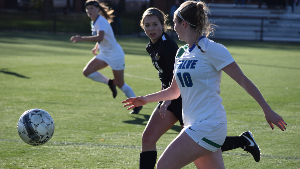 Abby McMackin (#10) has her eye on teammate Ella Rath during the Seahawks' ECAC Region I Championships game against Maine Maritime at Springfield College on Saturday. (Photo by Ed Habershaw)