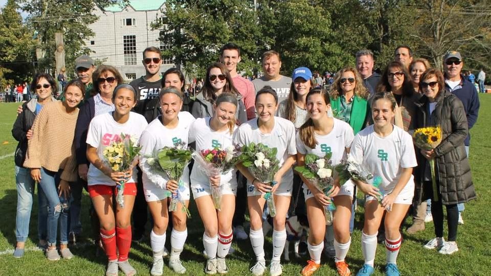 Seahawk seniors with their family before game on Saturday - Carly Pala, Nicole Georges, Abby McMackin, Kathryne Stimpson, Natalie Labella, Delaney Maxell.