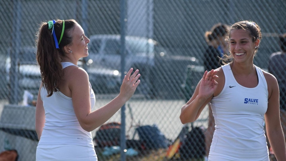 Anna Godshalk and Erin Stangel grabbed four games at third doubles. (Photo by Ed Habershaw)