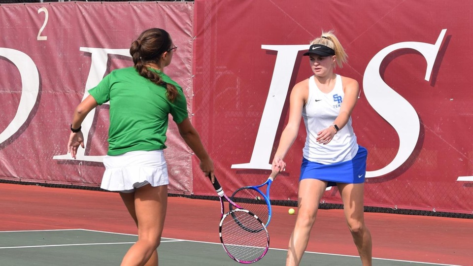 Lily Gorman (left) and Annemarie Haas competed at third doubles for the Seahawks against the Wildcats. (Photo by Ed Habershaw)