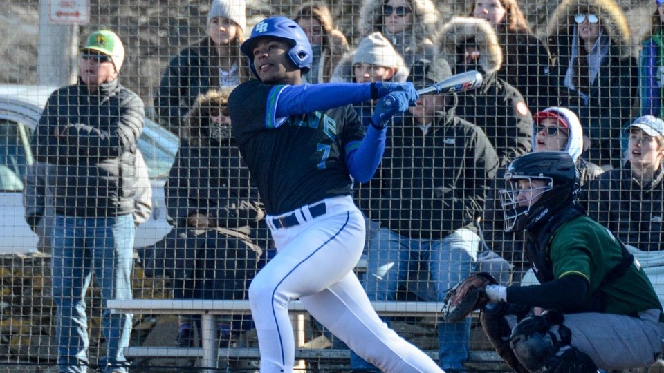 Justice Welch takes his first collegiate swing on a 3-1 pitch in the bottom of the 6th and launches a grand slam home run to boost Salve Regina's lead to 10-0 over Fitchburg State. (Photo by George Corrigan)