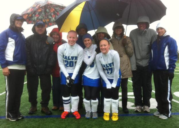 Seahawk seniors - Michelle Massey, Samantha Dalton, Sophie Eldridge - are flanked by their parents and coaches before the their final regular season home game against the Nor'easters at Gaudet Field.