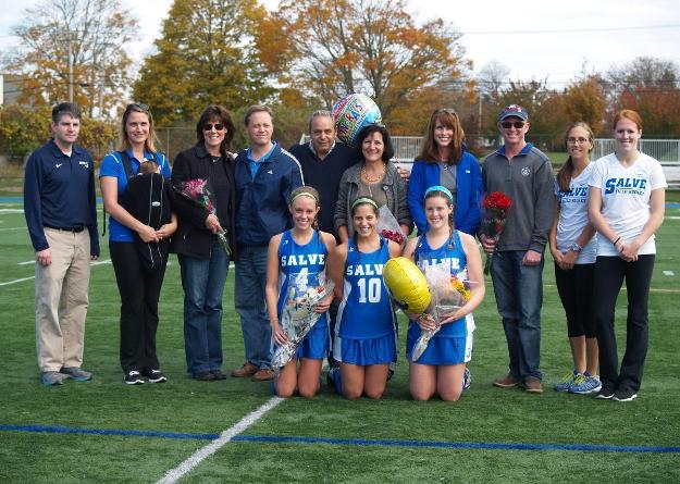Seniors Heather Kapatoes, Lisa Bucci and Jessica Whittier were honored before the game.