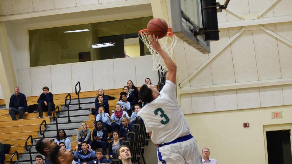 David Hanson's layup brought Salve Regina within one in the final minute. (Photo by Erica Bonnette-Lykens)