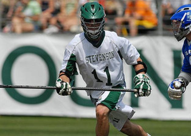 Coach Evan Douglass, playing for Stevenson University last year, was the 2011 National Defensive Player of the Year.