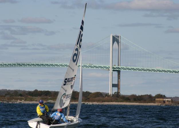 Bob Lippincott and Baillie Lawless compete in Newport Harbor during the first annual Sister Esther Open hosted by the Salve Regina University sailing team.