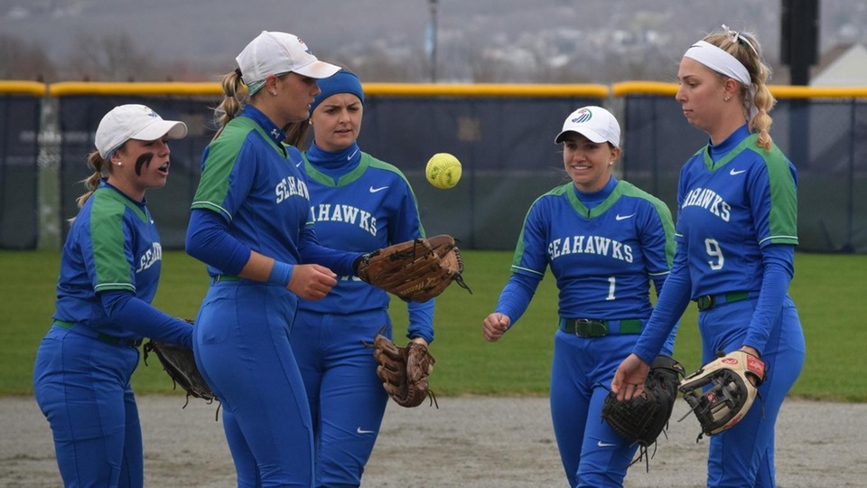 Lauren Packer (right) and Allie Gusmano (left) had back-to-back basehits with two outs in the second to give Salve Regina its only lead of the day in Game One in Bristol. (Photo by Ed Habershaw)