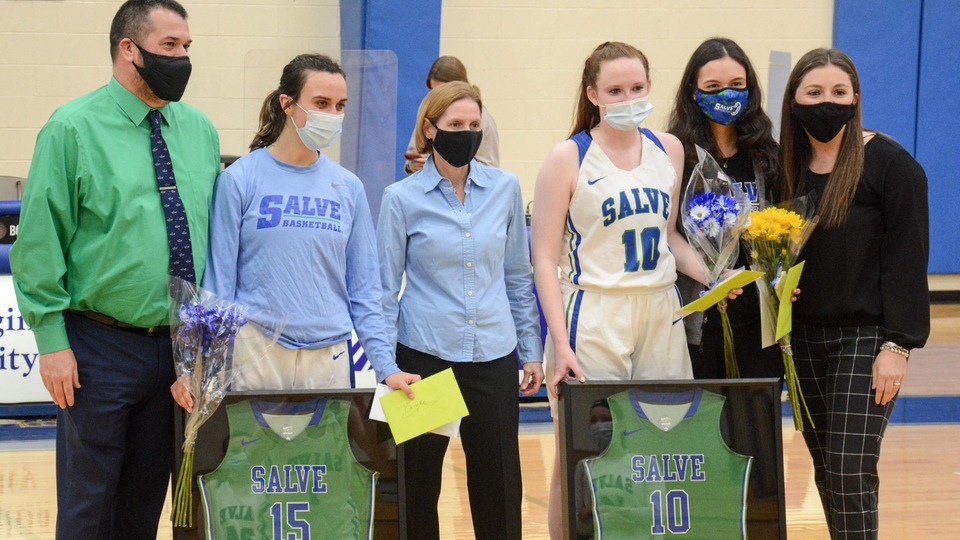 Staff and players celebrating Senior Day for the Seahawks (l to r): Assistant Coach Tony Soly, Brooke Vonasek '21, Head Coach Cori Hughes, Mary Rorke '21, Abby Williamson '21, Assistant Coach Liv Pierce '21 (photo by George Corrigan '22).