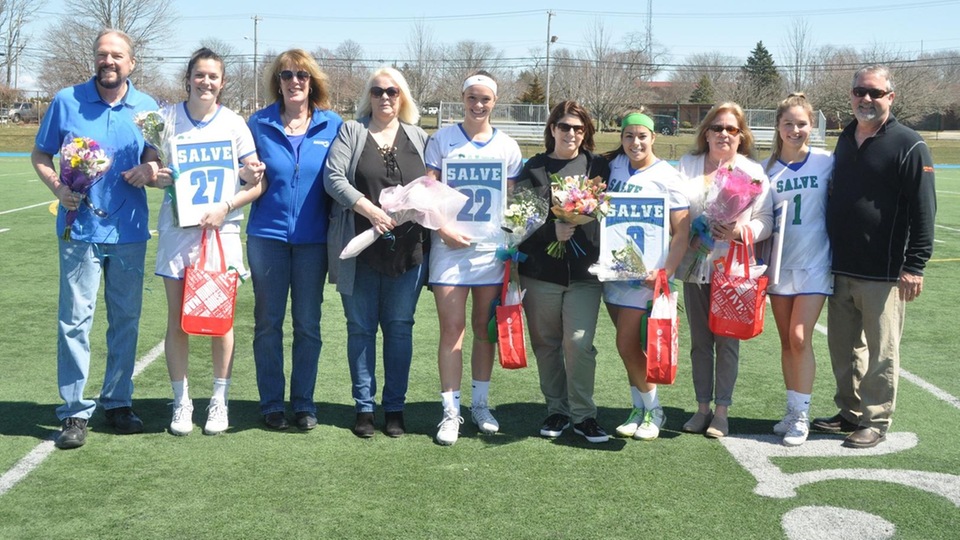 Salve Regina honored their four seniors Lindsey Smith, Kerri Beland, Victoria Johnson, and Olivia Slysz (l-r) before its 22-7 victory over Nichols.