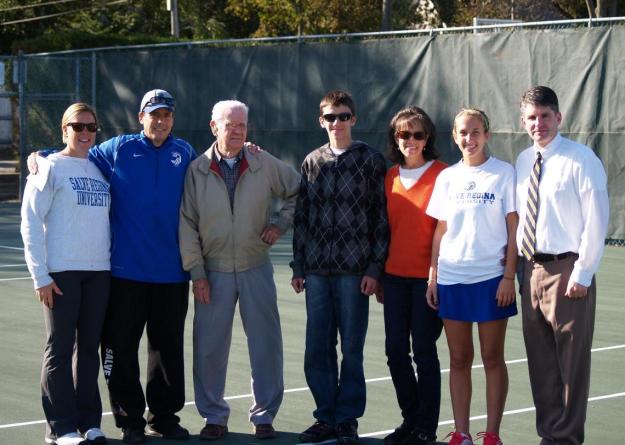 Nichol Stevens '12 (second from right) and her family are joined by Seahawk coaches Lissa von Brecht (on left) and Ed Habershaw (second from left) and Salve Regina athletic director Colin Sullivan (on right) for senior day.