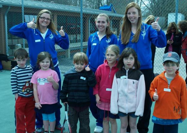 Seahawks playing tennis with local children celebrating the passions of former Salve Regina player, the late Meghan E. Strathman '03.