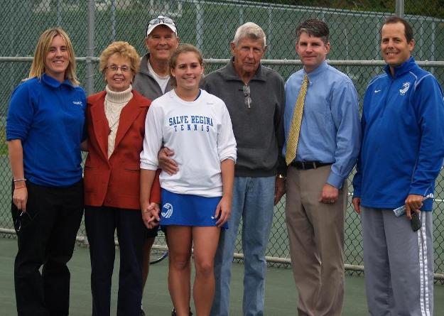 Seahawk senior Elizabeth Liguori poses with her grandparents and (l-r) associate athletic director Kelly Scafariello, head coach Cory Tusler, athletic director Colin Sullivan, and former head coach - current sports information director Ed Habershaw.