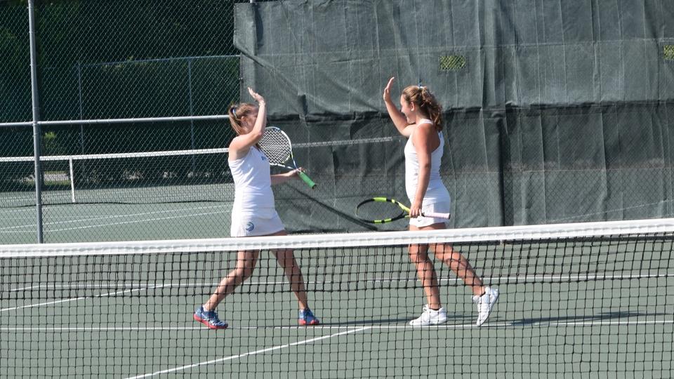 Lauren Harvey and Makenzie Sadler account for all three Seahawk points during dual match in Providence. (Photo by Lynne Habershaw)