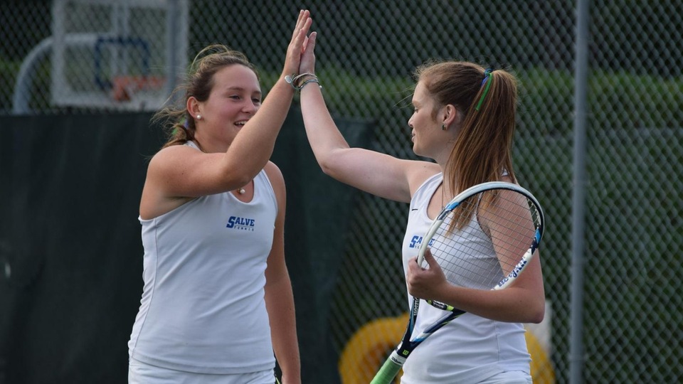 Makenzie Sadler (left) and Lauren Harvey competed at first doubles and then second and first singles, respectively. (Photo by Ed Habershaw)