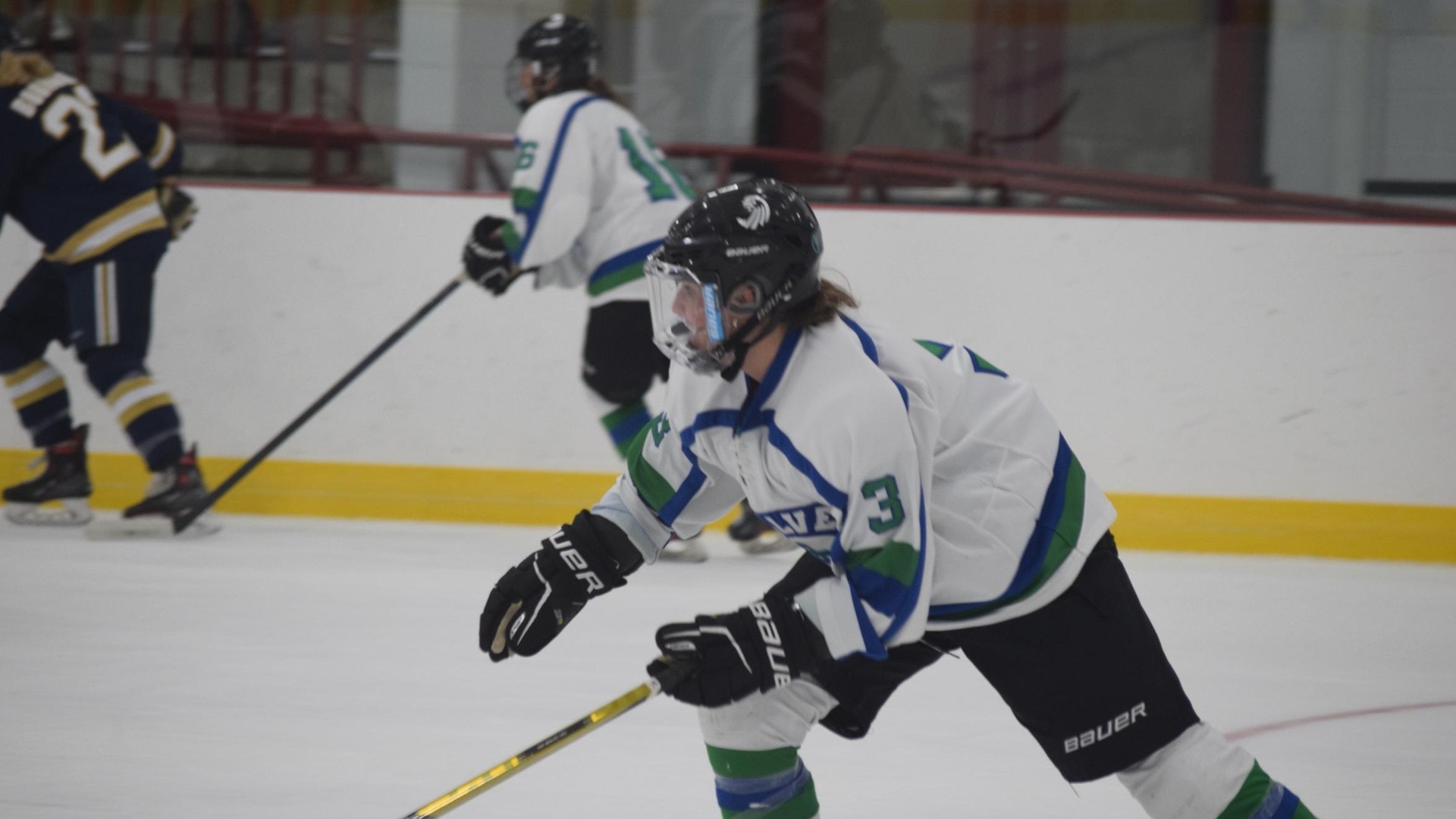 Taylor Stirling '26 eyes the puck (Photo by Ed Habershaw).